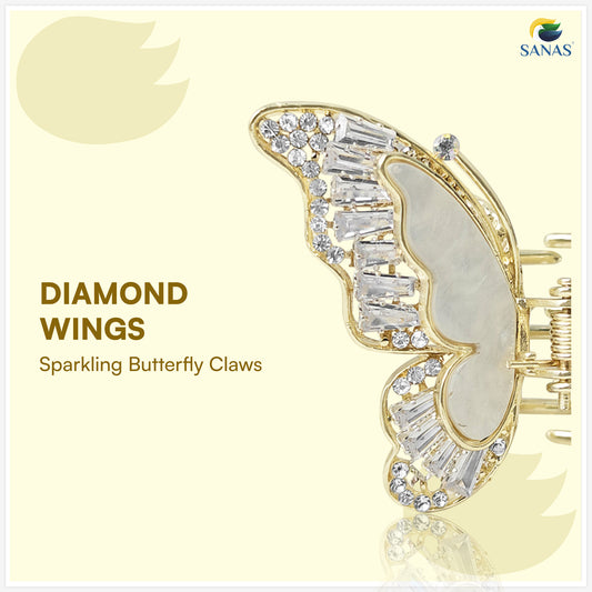 Diamond winged butterfly clasp with 'Sanas' branding on a light yellow background