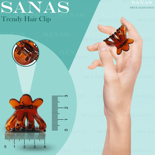 Trendy hair clip with hand holding it, scale for size reference, and 'SANAS' branding on a teal background.