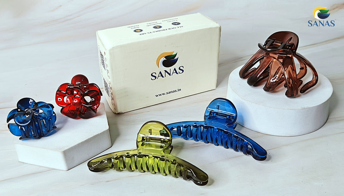Acrylic hair clips set by SANAS featuring octopus, flower, and long claw clips in red, blue, green, and brown colors. Displayed with branded packaging—ideal for girls and women. Hair accessories for daily styling, gifting, and bun or puff hairstyles.