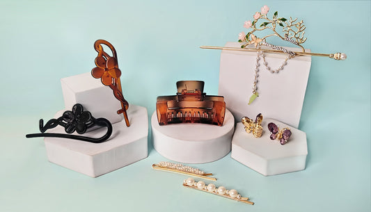 Hair accessories for women featuring claw clip, floral hair sticks, pearl bobby pins, butterfly clips, and bridal juda pins—perfect for bun styling, weddings, and everyday looks.