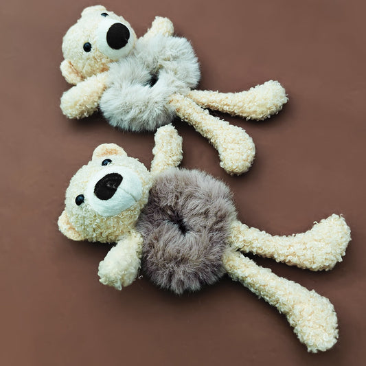 Set of two teddy scrunchies in beige and brown, made with soft, plush fabric. Stylish hair accessories perfect for women and girls, ideal for gifting or daily wear.