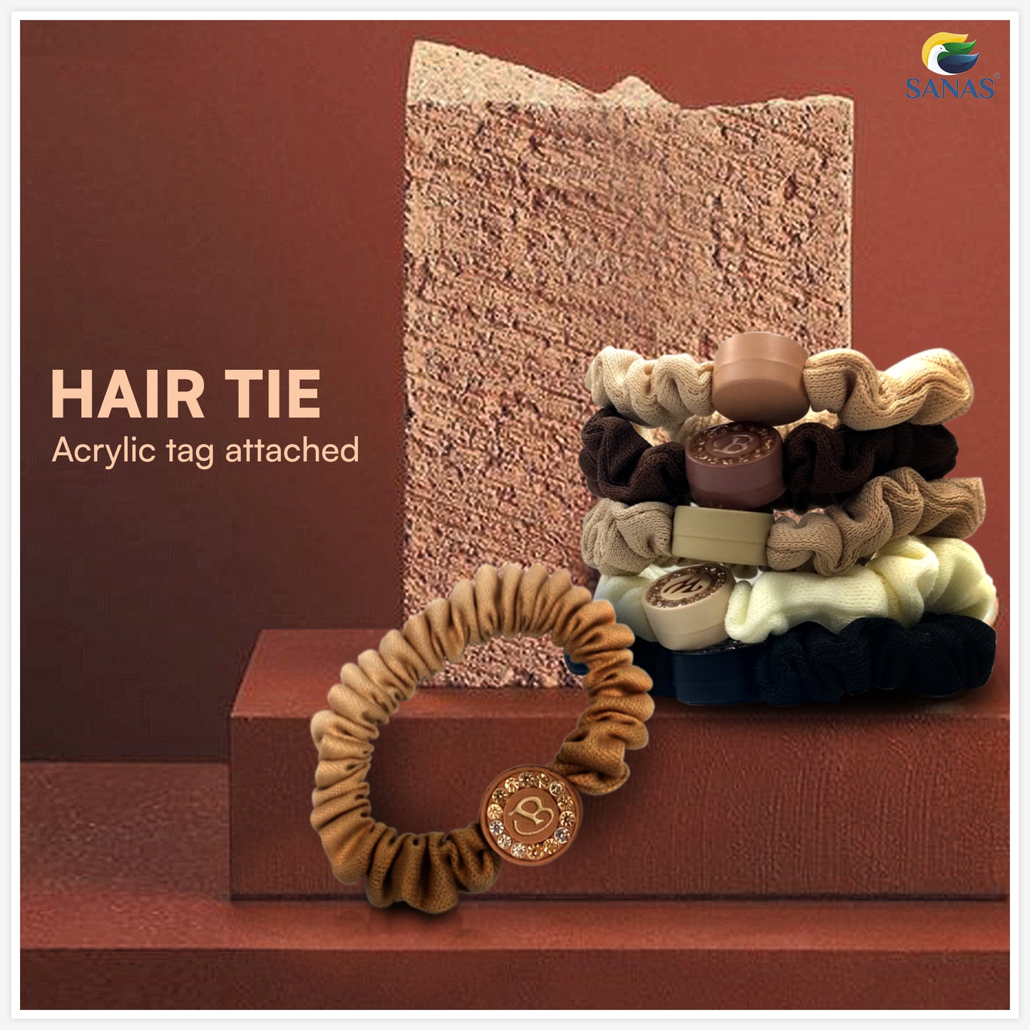 Nude shade scrunchies for hair with decorative stone alphabet charms by SANAS