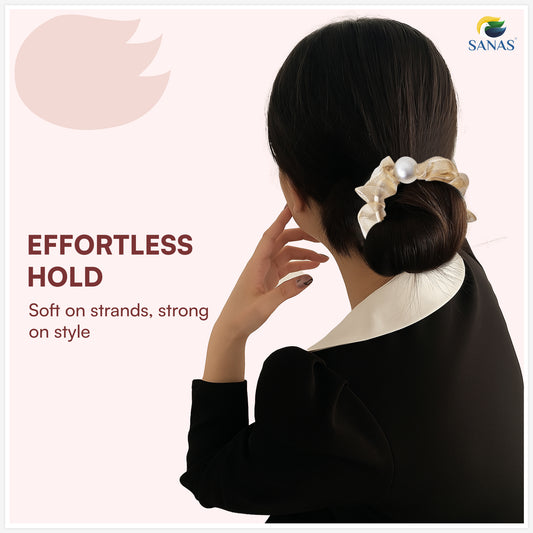 Woman with styled hair using a hair tie, with 'SANAS' branding and product description text.