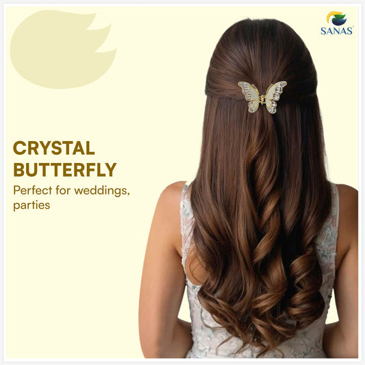 Woman with long hair wearing a crystal butterfly hair clip on a light yellow background