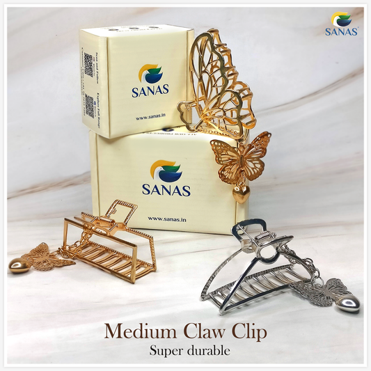 Butterfly-shaped hair clips with 'SANAS' packaging on a white background
