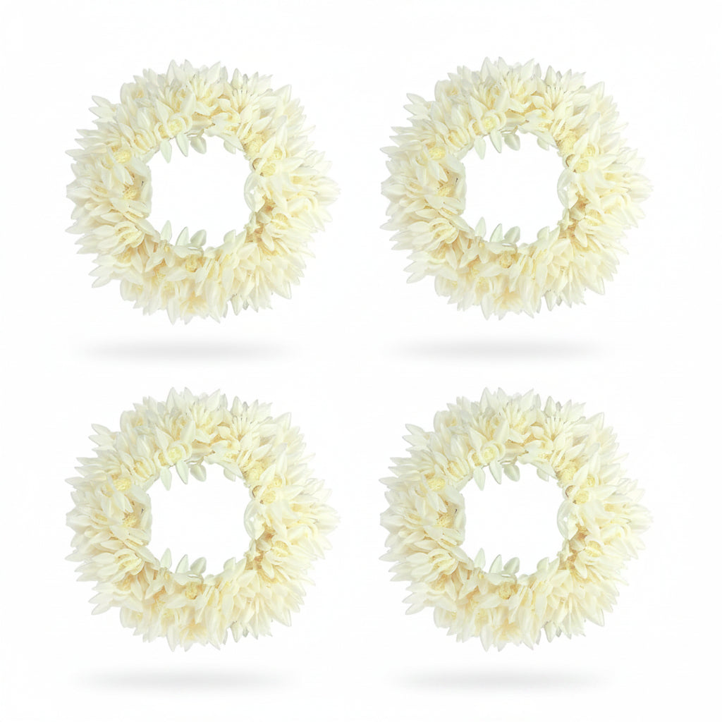 Four cream-colored floral wreaths on a white background