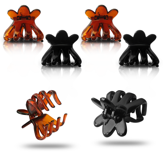 Set of black and tortoiseshell hair clips on a white background