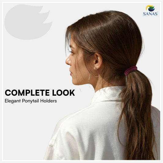 Woman with a ponytail wearing an elegant ponytail holder against a light background, featuring the brand 'SANAS'.